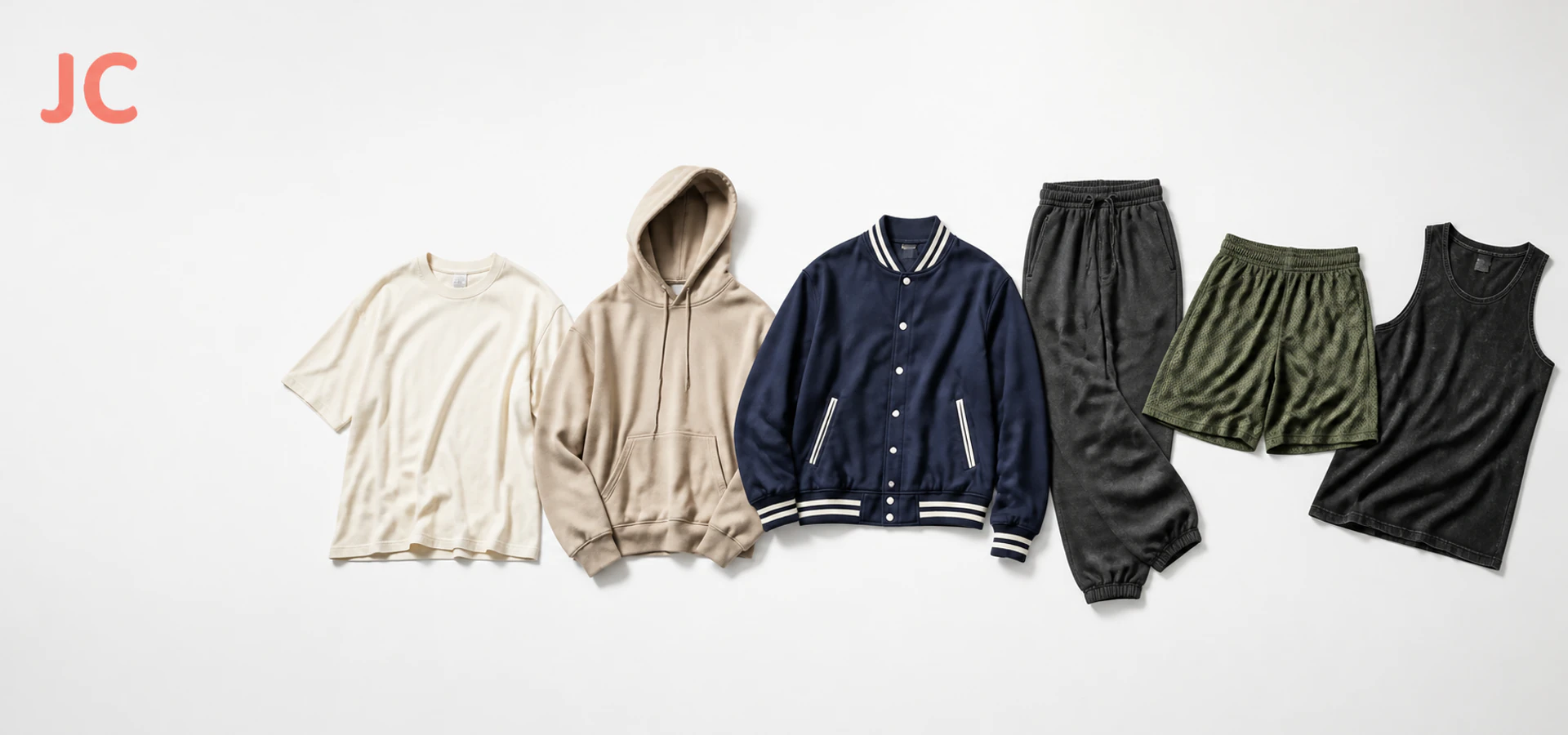 Custom apparel flat lay with hoodie, T-shirts, shorts and jacket